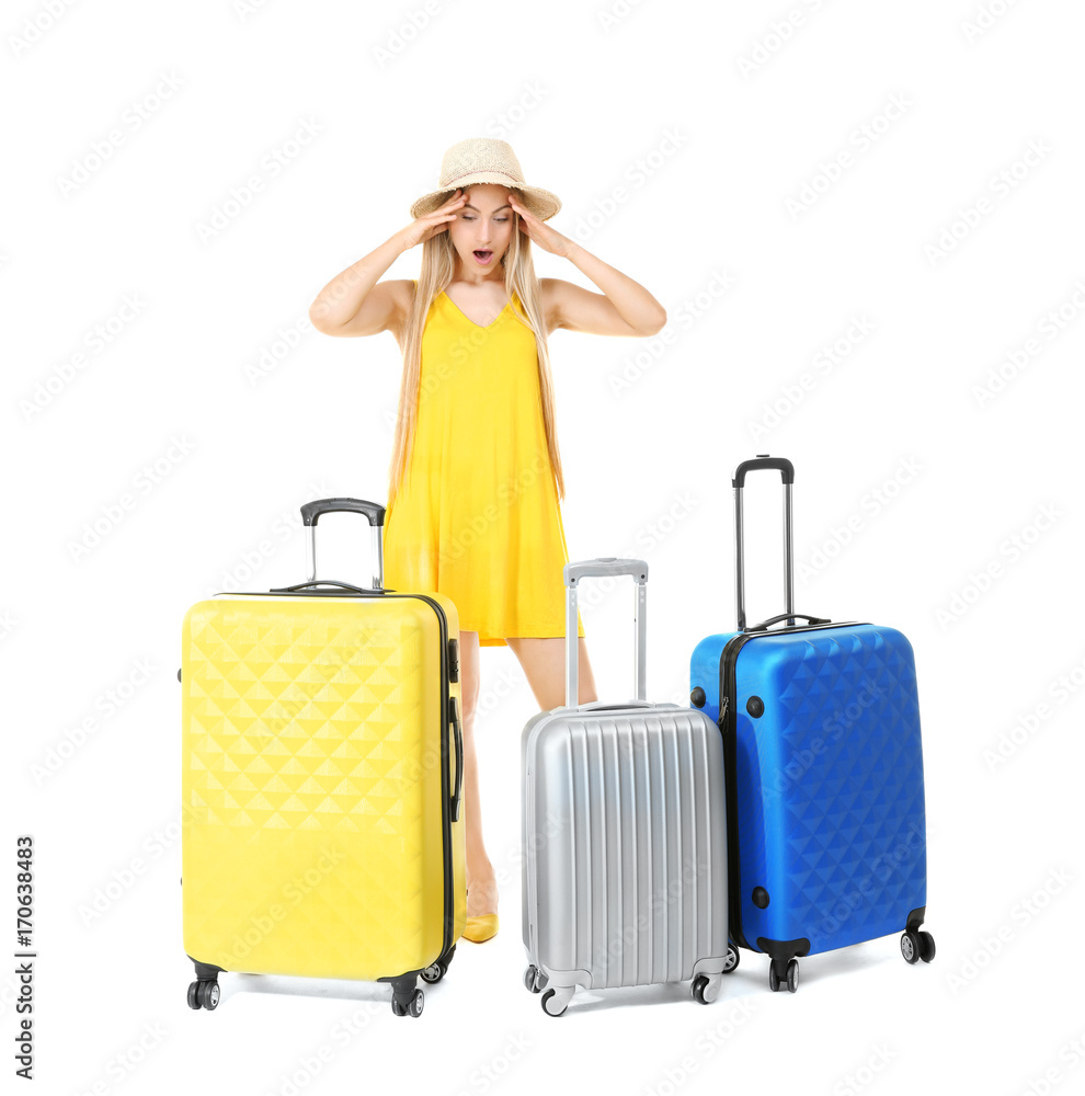 Young woman with suitcases on white background. Luggage overweight concept Young woman with suitcases on white background. Luggage overweight concept