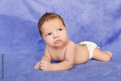 Cute little baby lying on s...
