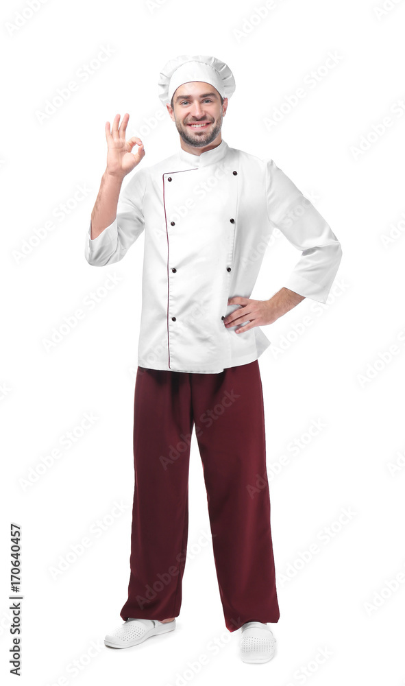 Young male chef isolated on white