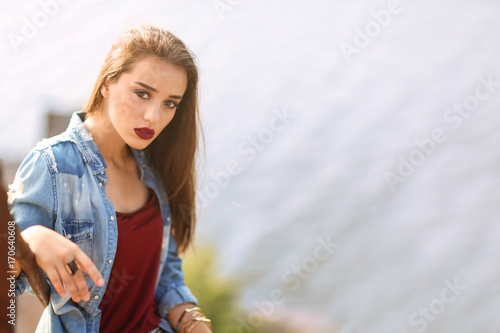 Young fashionable woman out...