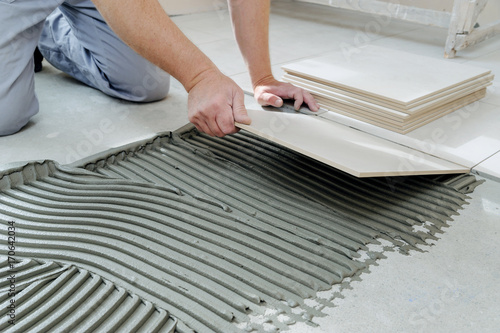 Laying Ceramic Tiles. photo