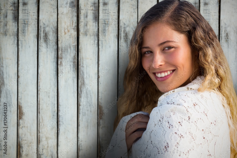Fototapeta premium Composite image of portrait of beautiful brunette woemn