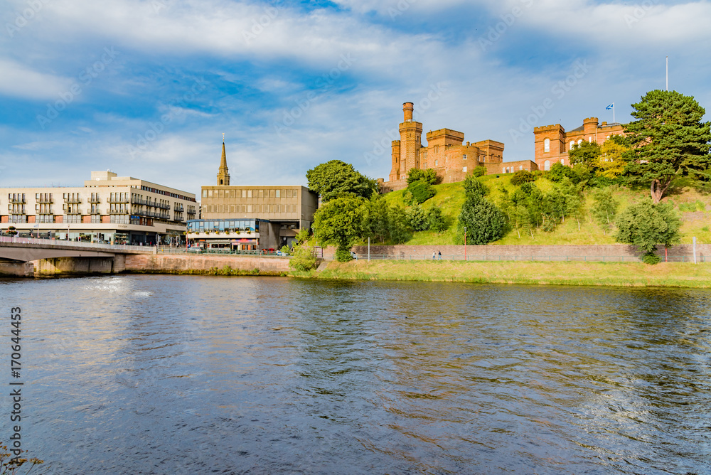 scenery of the Scottish Highlands in England in the city of Inverness with the castle on Loch Lake Ne...