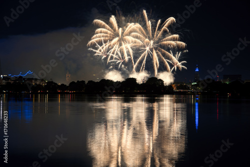 nightly panorama of Hamburg - Inner City with firework over the lake Alster