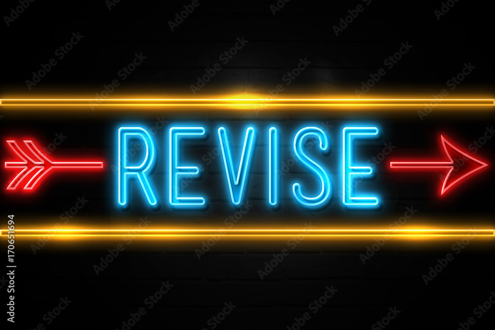 Revise  - fluorescent Neon Sign on brickwall Front view