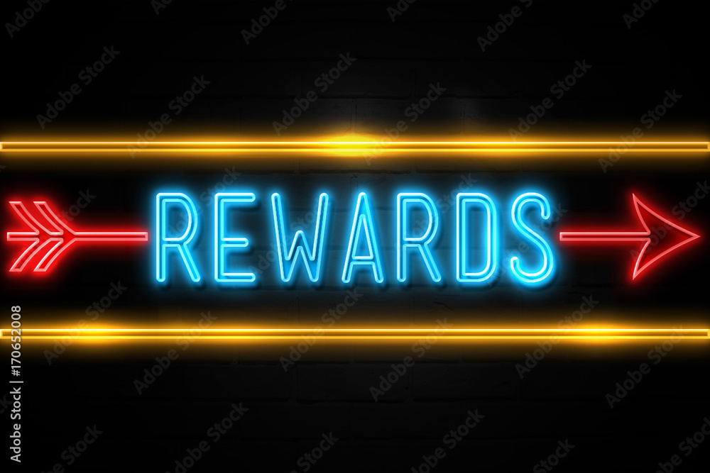 Rewards  - fluorescent Neon Sign on brickwall Front view