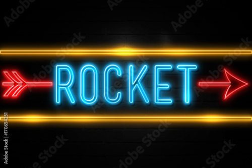 Rocket - fluorescent Neon Sign on brickwall Front view