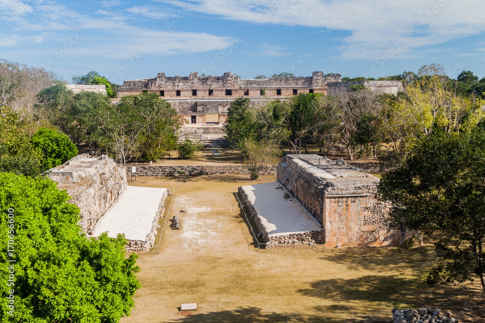Ball court (Juego de Pelota) and Nun's Quadrangle (Cuadrangulo de las Monjas) in the background at the ruins of the ancient Mayan city Uxmal, Mexico