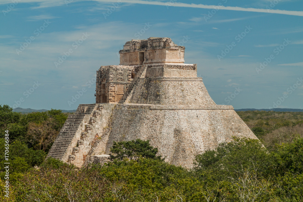 Pyramid of the Magician (Piramide del adivino) at the ruins of the ancient Mayan city Uxmal, Mexico