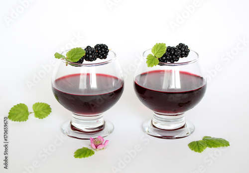 Blackberry alcoholic drink on white background 
