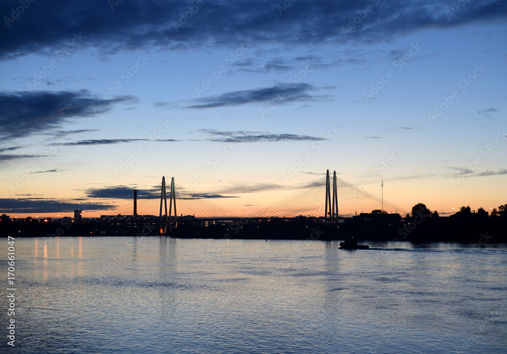 Cable-stayed bridge at sunset.
