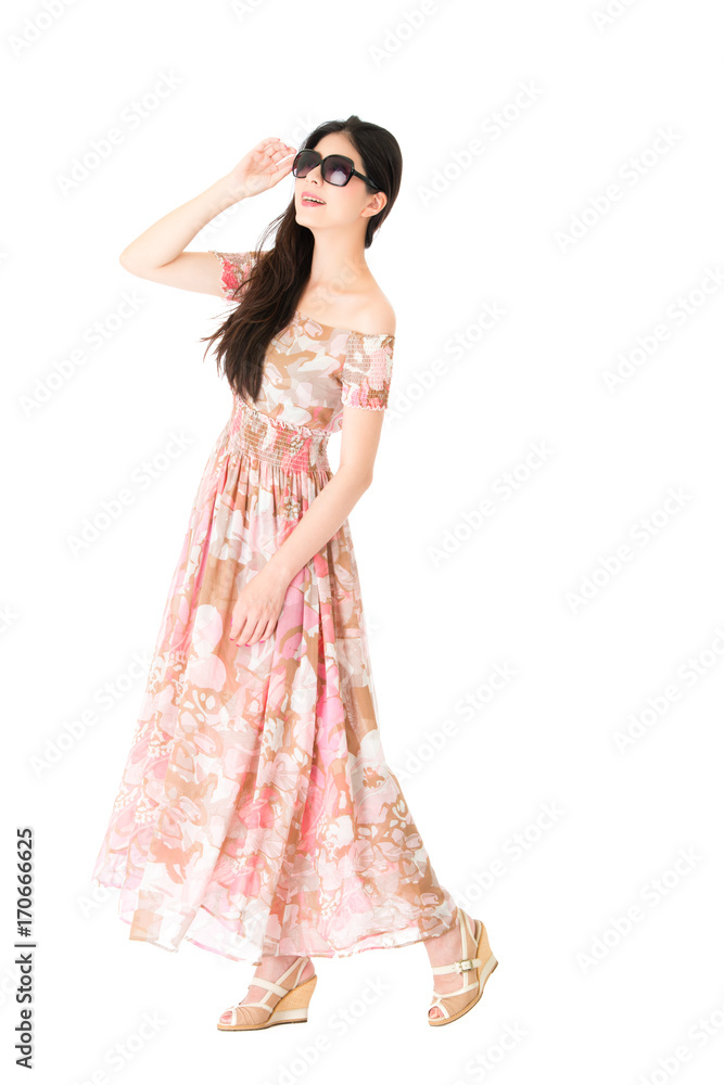girl holding sunglasses and wearing summer dress girl holding sunglasses and wearing summer dress