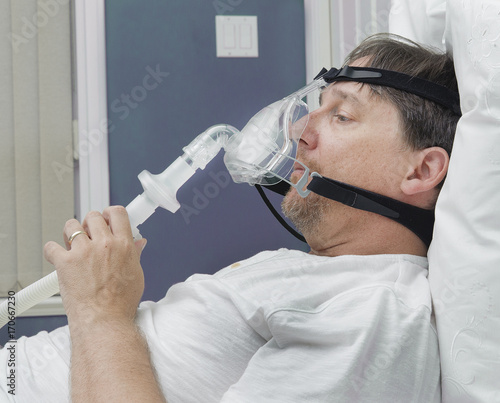 Man tries CPAP mask