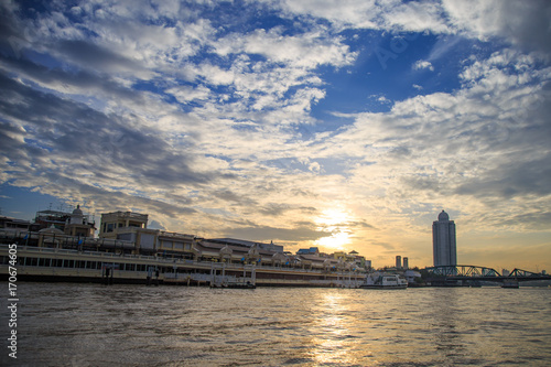 Chao Phraya riverfont view from Express boat with morning light.