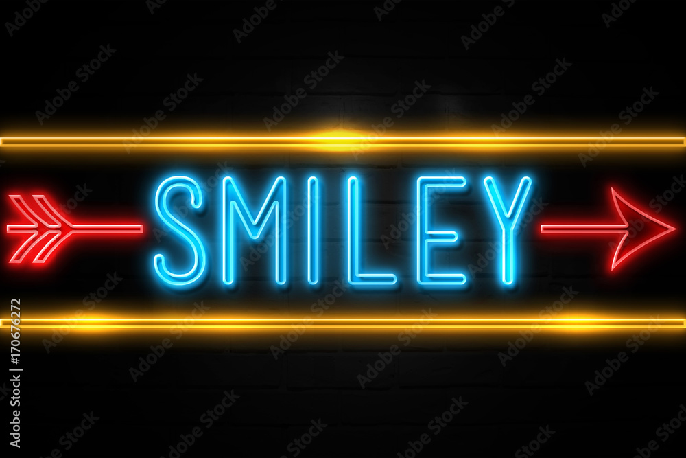 Smiley - fluorescent Neon Sign on brickwall Front view Smiley - fluorescent Neon Sign on brickwall Front view