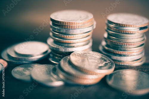 rows of coins for finance and business concept