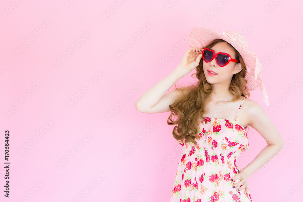 asian young beautiful woman in summer fashion on pink background with copy space. asian young beautiful woman in summer fashion on pink background with copy space.