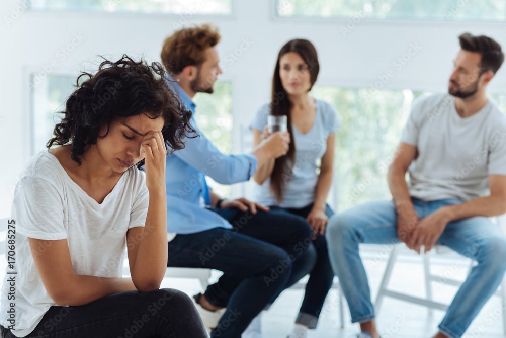 Unhappy young woman being depressed Unhappy young woman being depressed