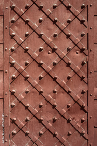 iron door closeup for texture or background, vintage style, brown color