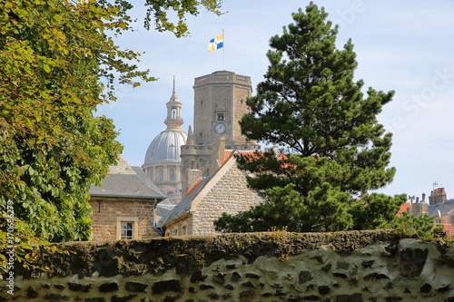 Obraz na plátně The ramparts with the Belfry and the Basilica of Notre Dame in the background, B
