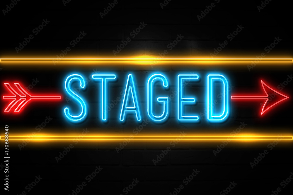 Obraz premium Staged - fluorescent Neon Sign on brickwall Front view