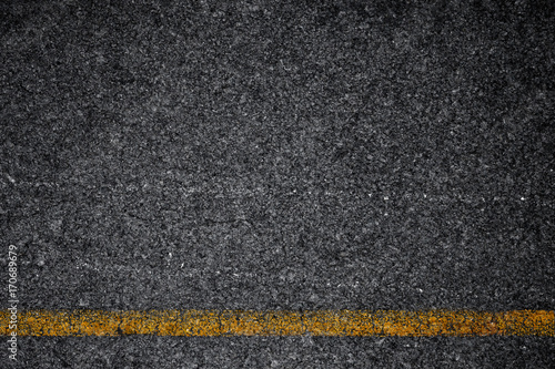 Asphalt background texture with some fine grain with road © photoraidz