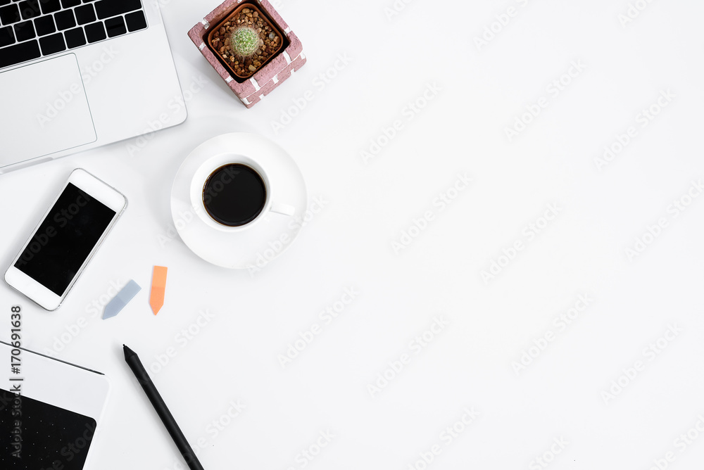 Graphic Designer white work table with computer, cactus, coffee, phone and pen for hard work in the morning with top view. Desk top view concept. Graphic Designer white work table with computer, cactus, coffee, phone and pen for hard work in the morning with top view. Desk top view concept.