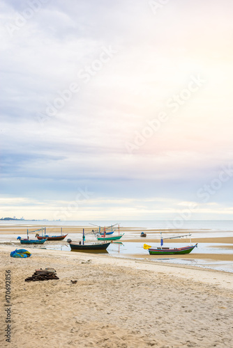 Fototapeta Naklejka Na Ścianę i Meble -  Old wooden fishing boat on the Hua Hin beach