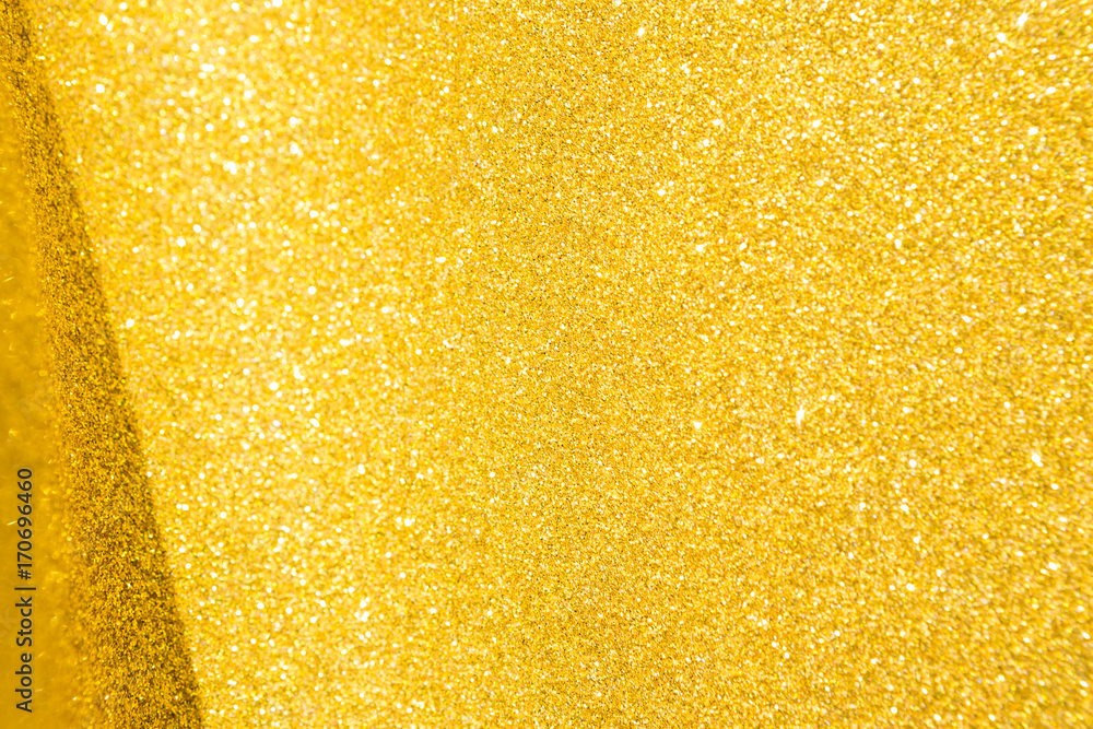 Gold glitter background, selective focus Gold glitter background, selective focus