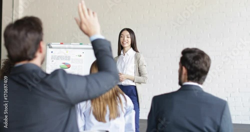 Asian Businesswoman Speaker On Presentation With Group Of Business People Asking Questions During Conference Meeting Training Seminar Slow Motion 60