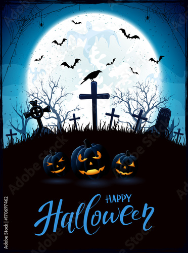 Halloween theme with pumpkins and raven on cemetery
