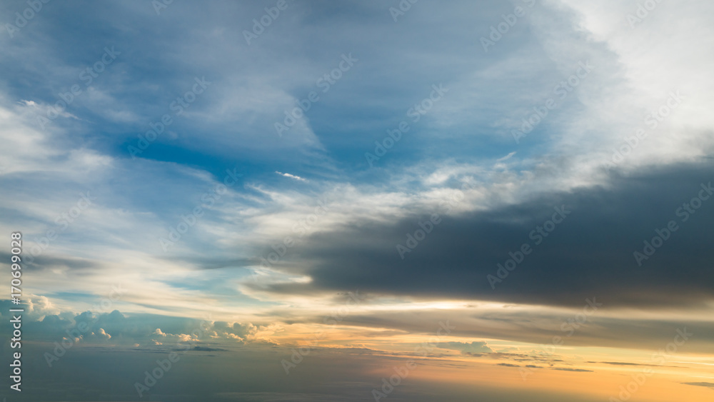  * Description/Title/Caption:  Multi-Coloured Cloud Blue Sky Background