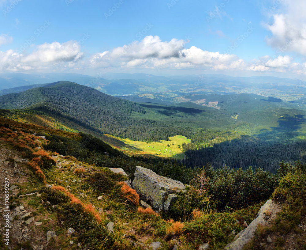 arpathian mountains autumn landscape with blue sky and clouds, natural travel background