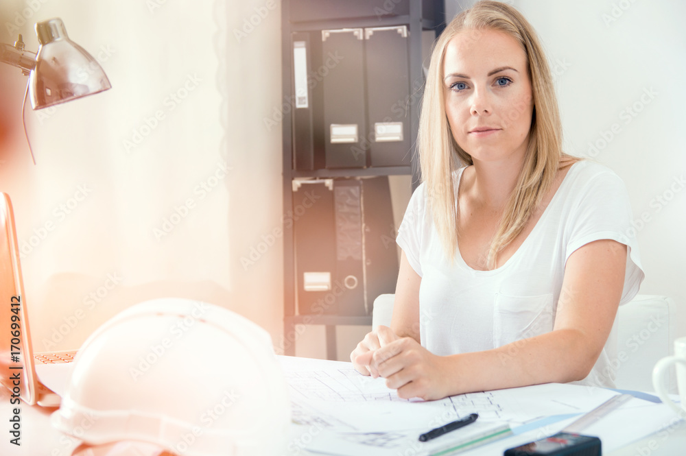 Architect is working with her new project at home office Architect is working with her new project at home office