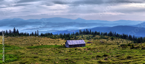 arpathian mountains autumn landscape with blue sky and clouds, natural travel background photo