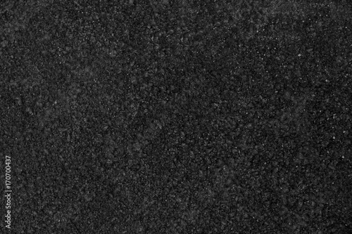 Asphalt background texture with some fine grain with road