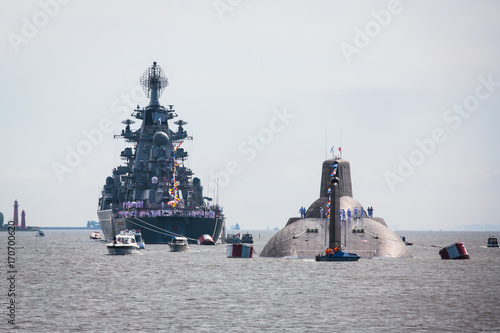 A line of modern russian military naval battleships warships in the row  northern fleet and baltic sea fleet in the open sea