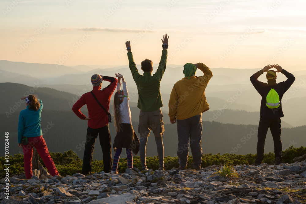 Happy friends during a travel in mountains