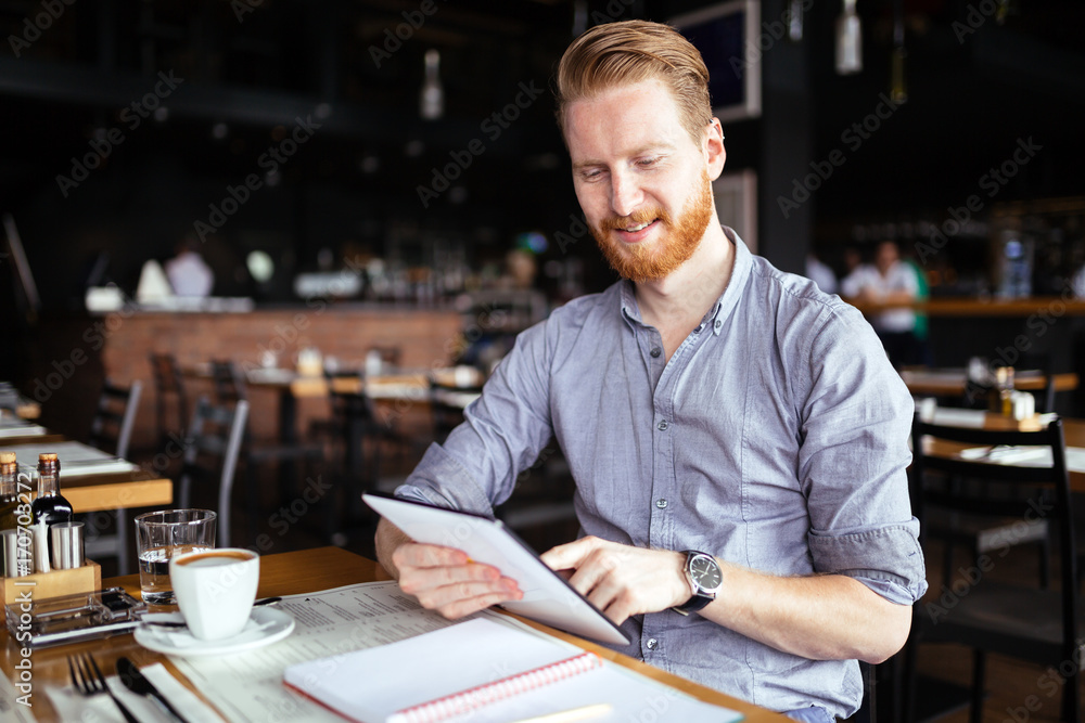 Businessman reading on break Businessman reading on break
