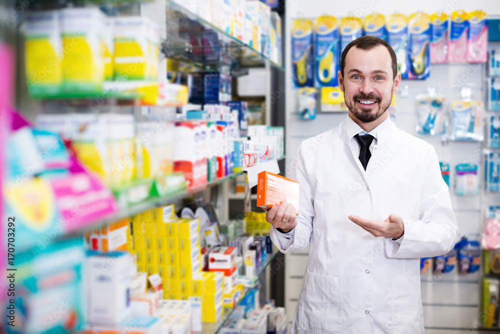 Pharmacist offering right drug in drugstore