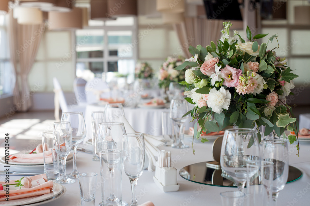 Wedding decor. Flowers in the restaurant, table setting