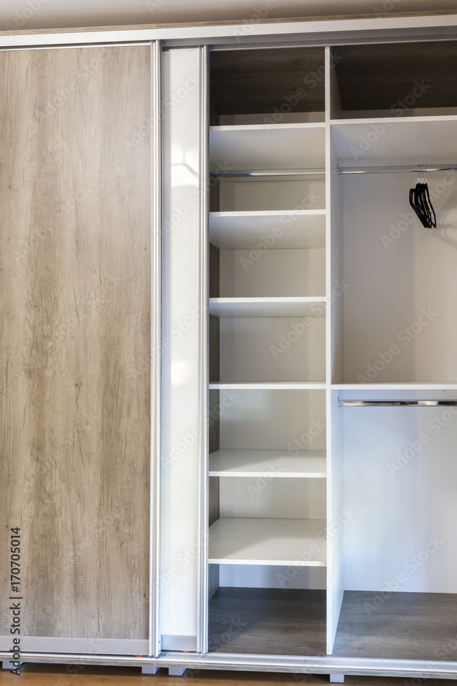 open wooden drawers in the closet open wooden drawers in the closet