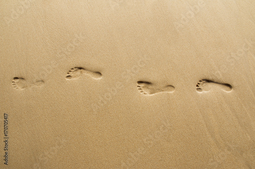Footprints on beach.
