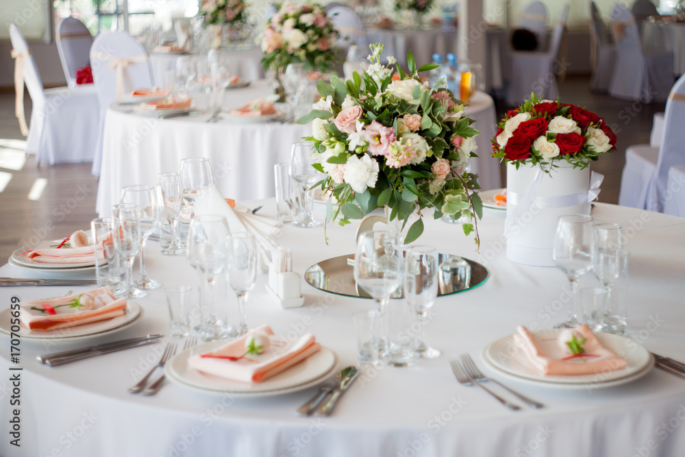 Wedding decor. Flowers in the restaurant, table setting