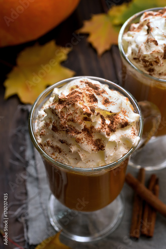Pumpkin latte with whipped cream and cinnamon
