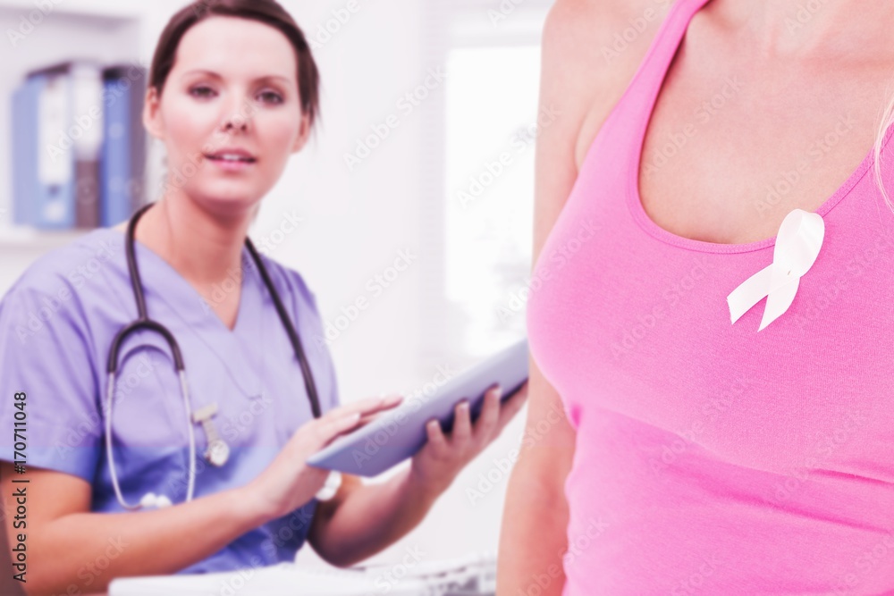 Composite image of mid section of woman with breast cancer Composite image of mid section of woman with breast cancer