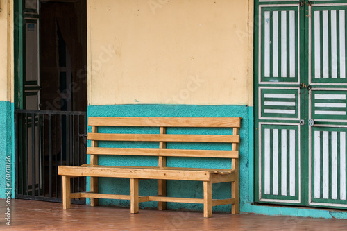 bench in front of colonial house in Ecuador