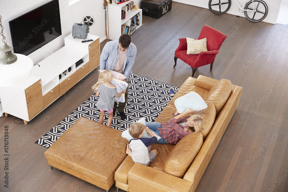 Obraz premium Overhead Shot Of Parents Playing With Children In Lounge