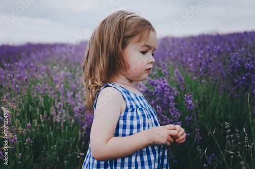 Little girl in a lavender field.