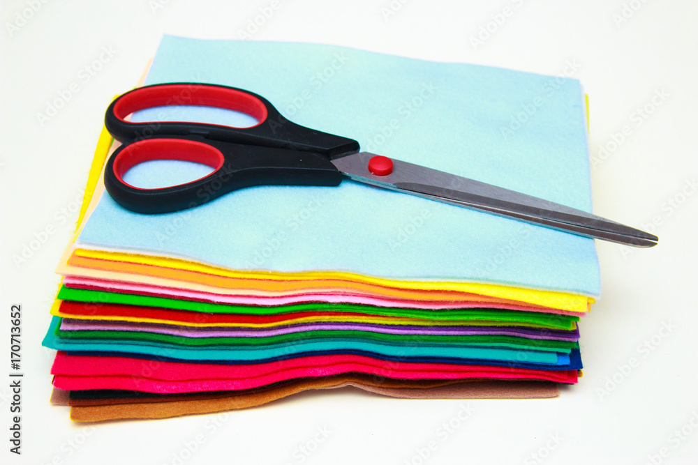 Sheets of felt, scissors, parts toy - sewing set for felt bird. How to make a handmade toy Sheets of felt, scissors, parts toy - sewing set for felt bird. How to make a handmade toy